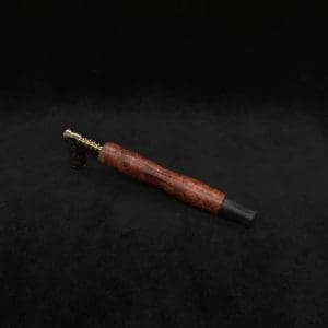 This image portrays Dynavap HyperDyn/Finned XL (D.W. Revision) + Matched Ebony M.P. by Dovetail Woodwork.
