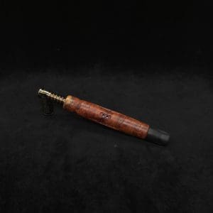 This image portrays Dynavap HyperDyn/Finned XL (D.W. Revision) + Matched Ebony M.P. by Dovetail Woodwork.