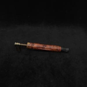 This image portrays Dynavap HyperDyn/Finned XL (D.W. Revision) + Matched Ebony M.P. by Dovetail Woodwork.