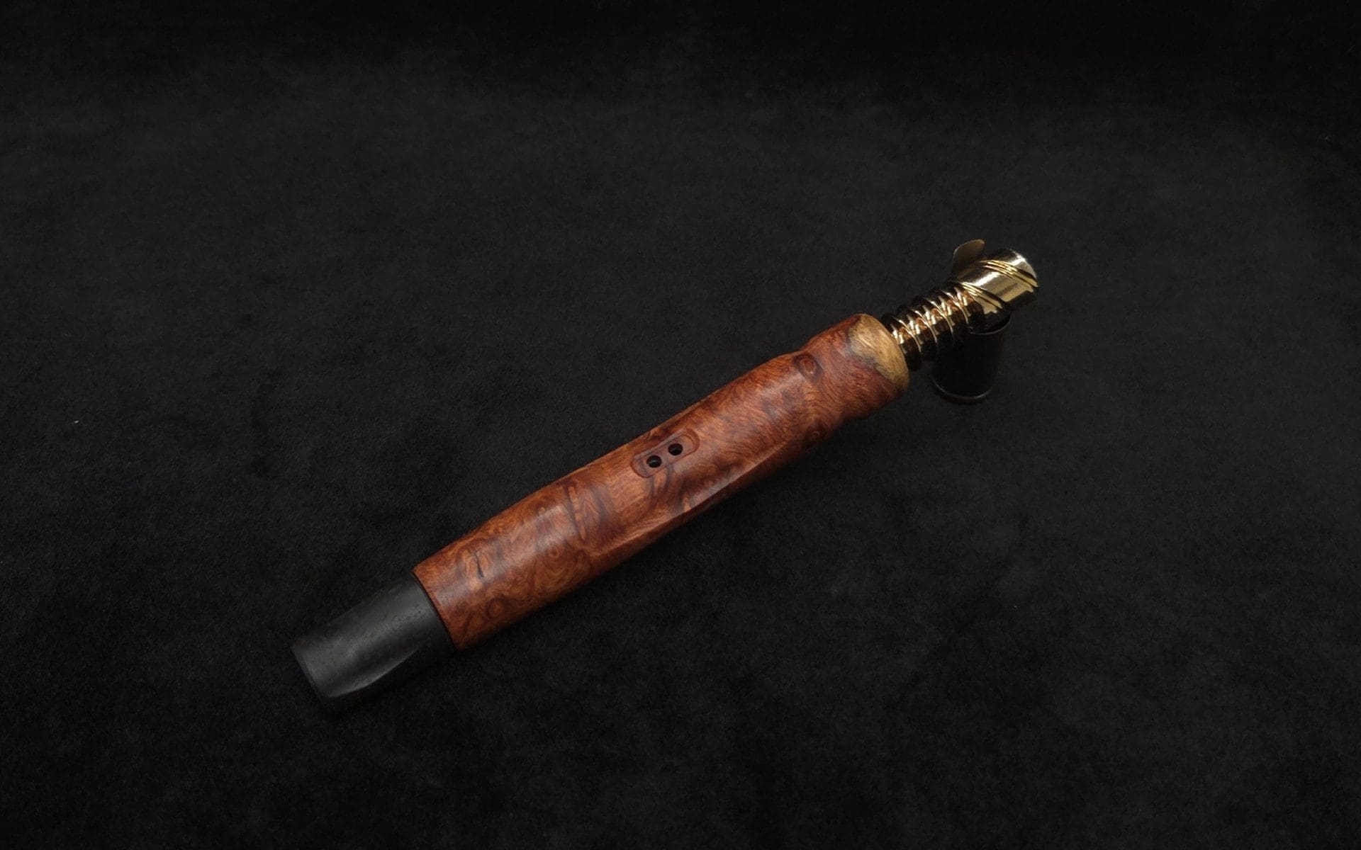 This image portrays Dynavap HyperDyn/Finned XL (D.W. Revision) + Matched Ebony M.P. by Dovetail Woodwork.