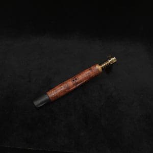 This image portrays Dynavap HyperDyn/Finned XL (D.W. Revision) + Matched Ebony M.P. by Dovetail Woodwork.