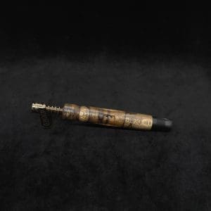 This image portrays Diamond Wing XL Dynavap Stem(Cross Grain Black Limba) + Matched Ebony M.P. by Dovetail Woodwork.