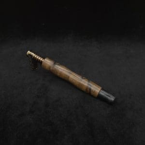 This image portrays Diamond Wing XL Dynavap Stem(Cross Grain Black Limba) + Matched Ebony M.P. by Dovetail Woodwork.