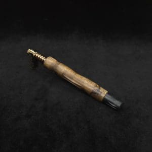 This image portrays Diamond Wing XL Dynavap Stem(Cross Grain Black Limba) + Matched Ebony M.P. by Dovetail Woodwork.